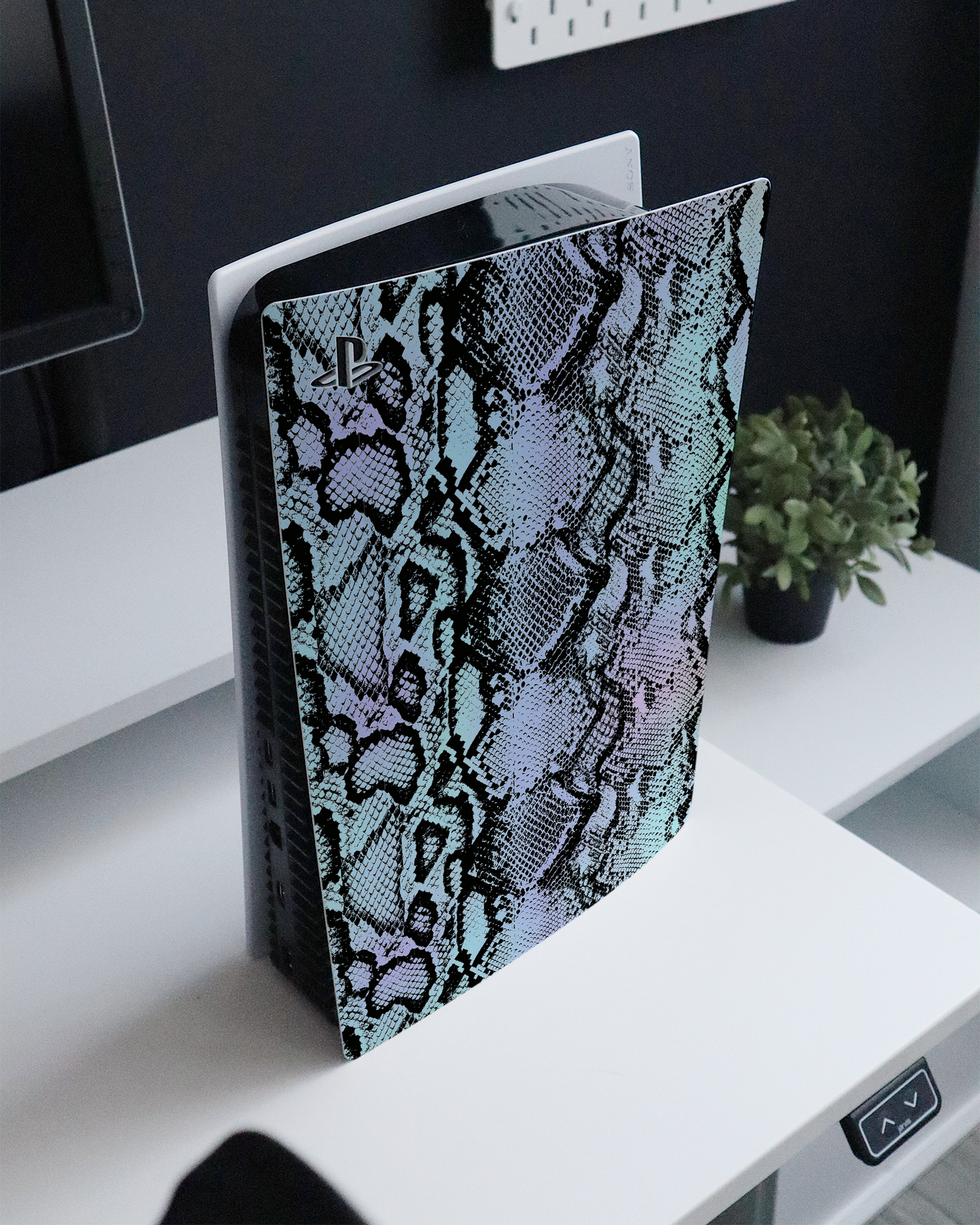 Groovy Snakeskin Console Skin for Sony PlayStation 5 Digital Edition standing on a sideboard 
