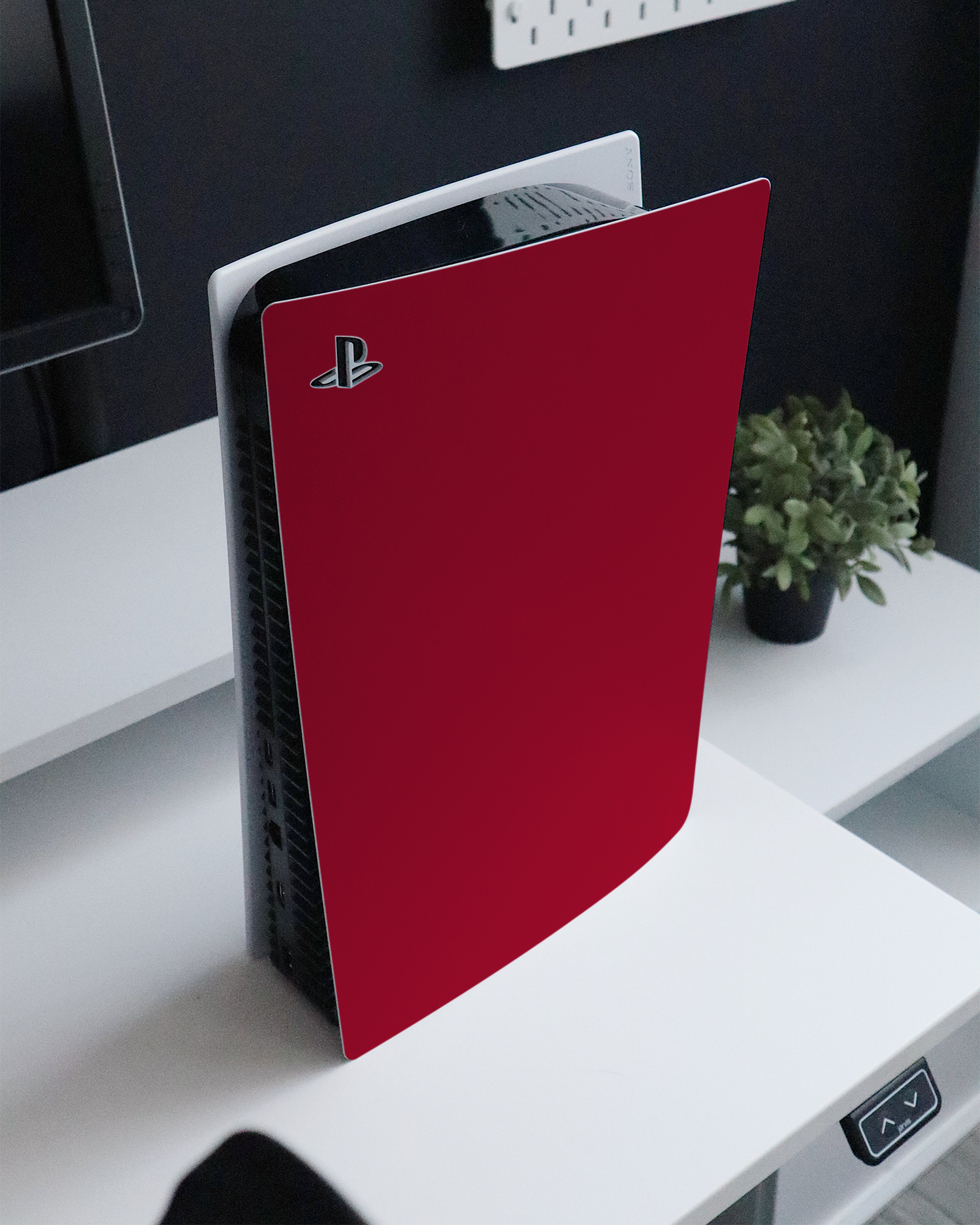 RED Console Skin for Sony PlayStation 5 Digital Edition standing on a sideboard 