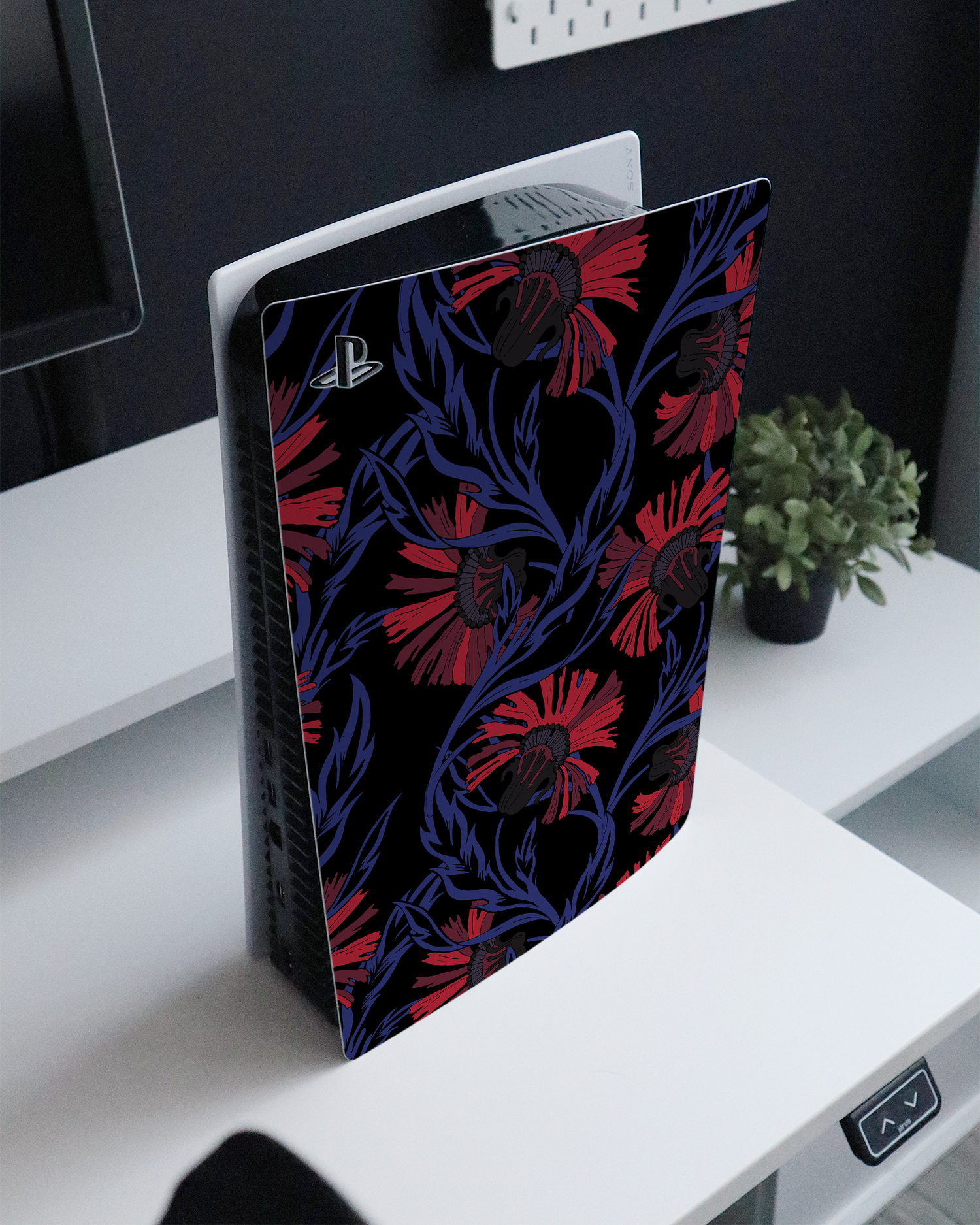 Midnight Floral Console Skin for Sony PlayStation 5 Digital Edition standing on a sideboard 