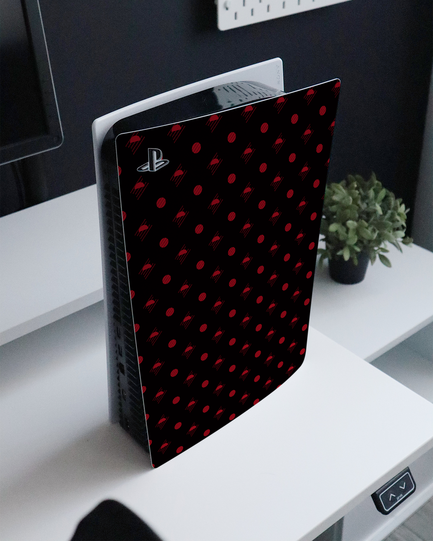 Dot Distrupt Console Skin for Sony PlayStation 5 Digital Edition standing on a sideboard 
