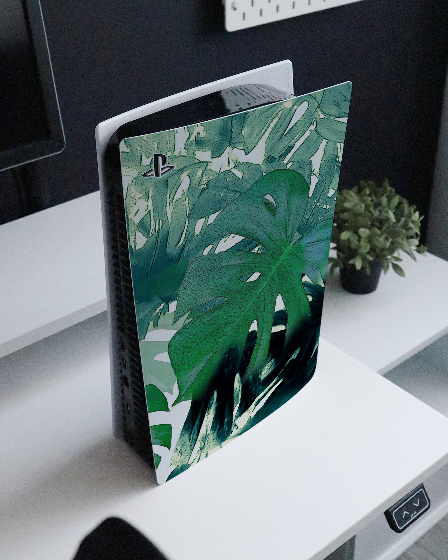 Saturated Plants Console Skin for Sony PlayStation 5 Digital Edition standing on a sideboard 