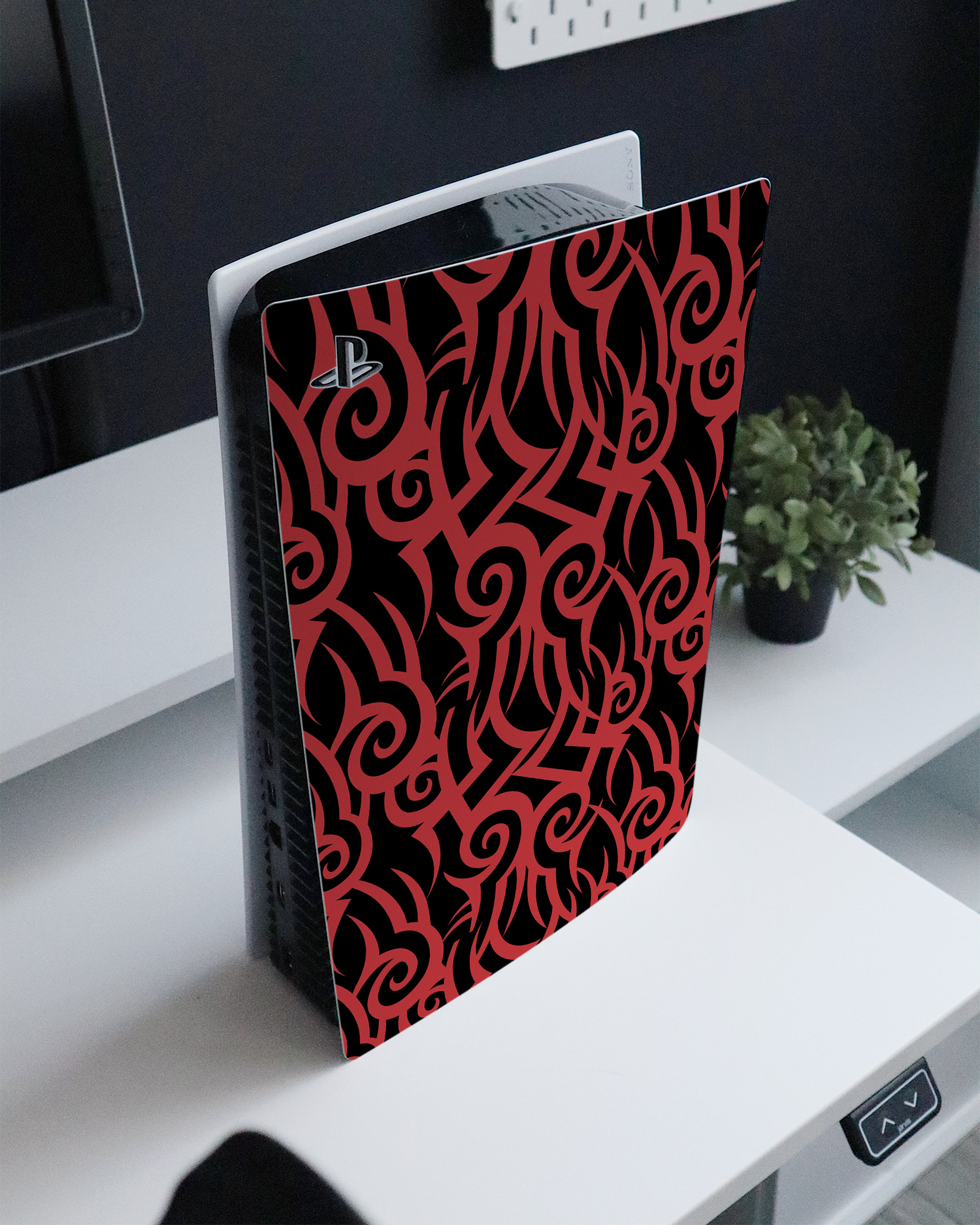 Tribal Pattern Console Skin for Sony PlayStation 5 standing on a sideboard 