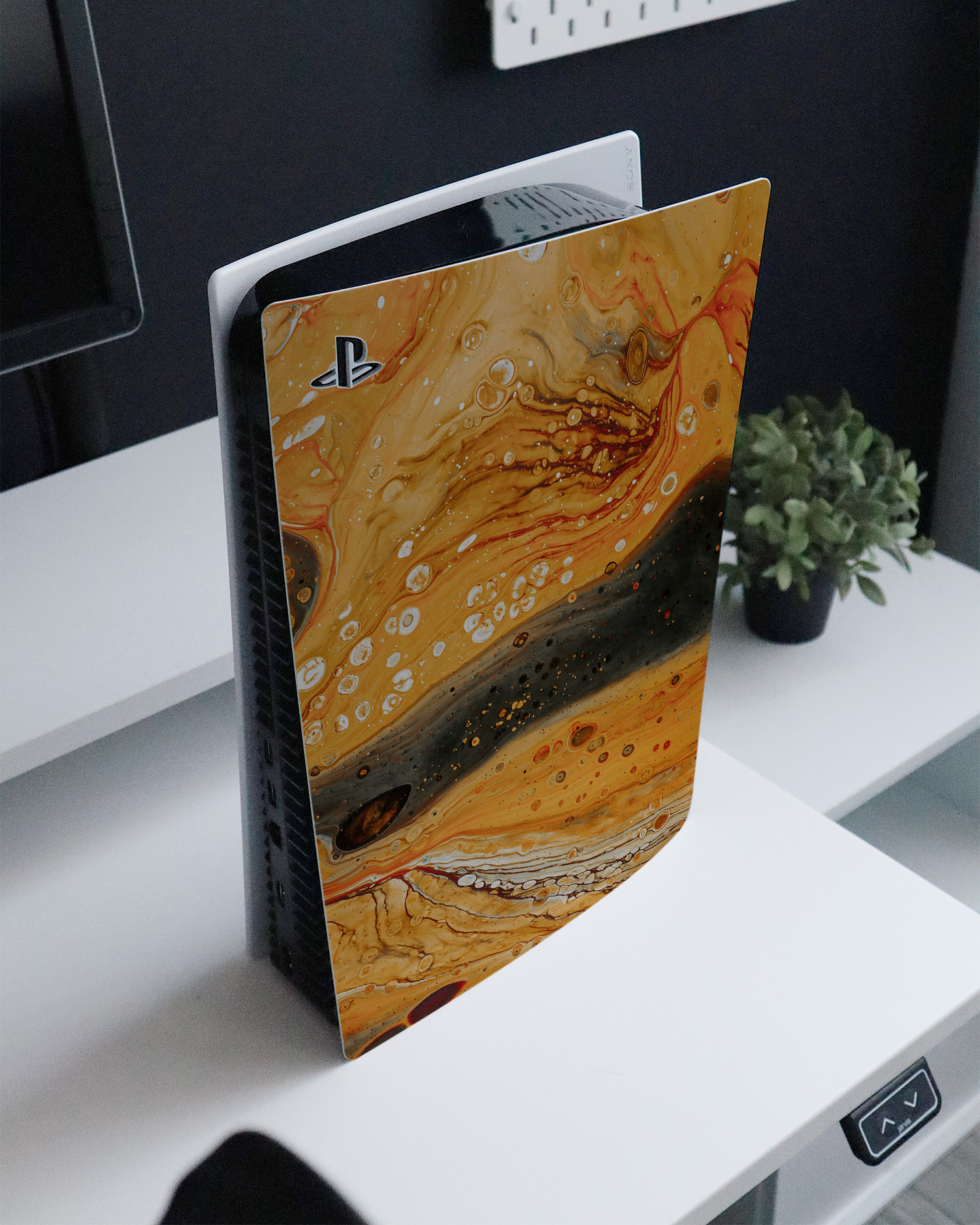 Jupiter Console Skin for Sony PlayStation 5 standing on a sideboard 