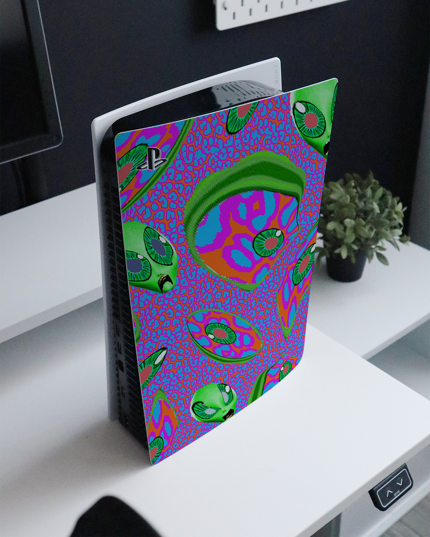Alien Trip Console Skin for Sony PlayStation 5 standing on a sideboard 