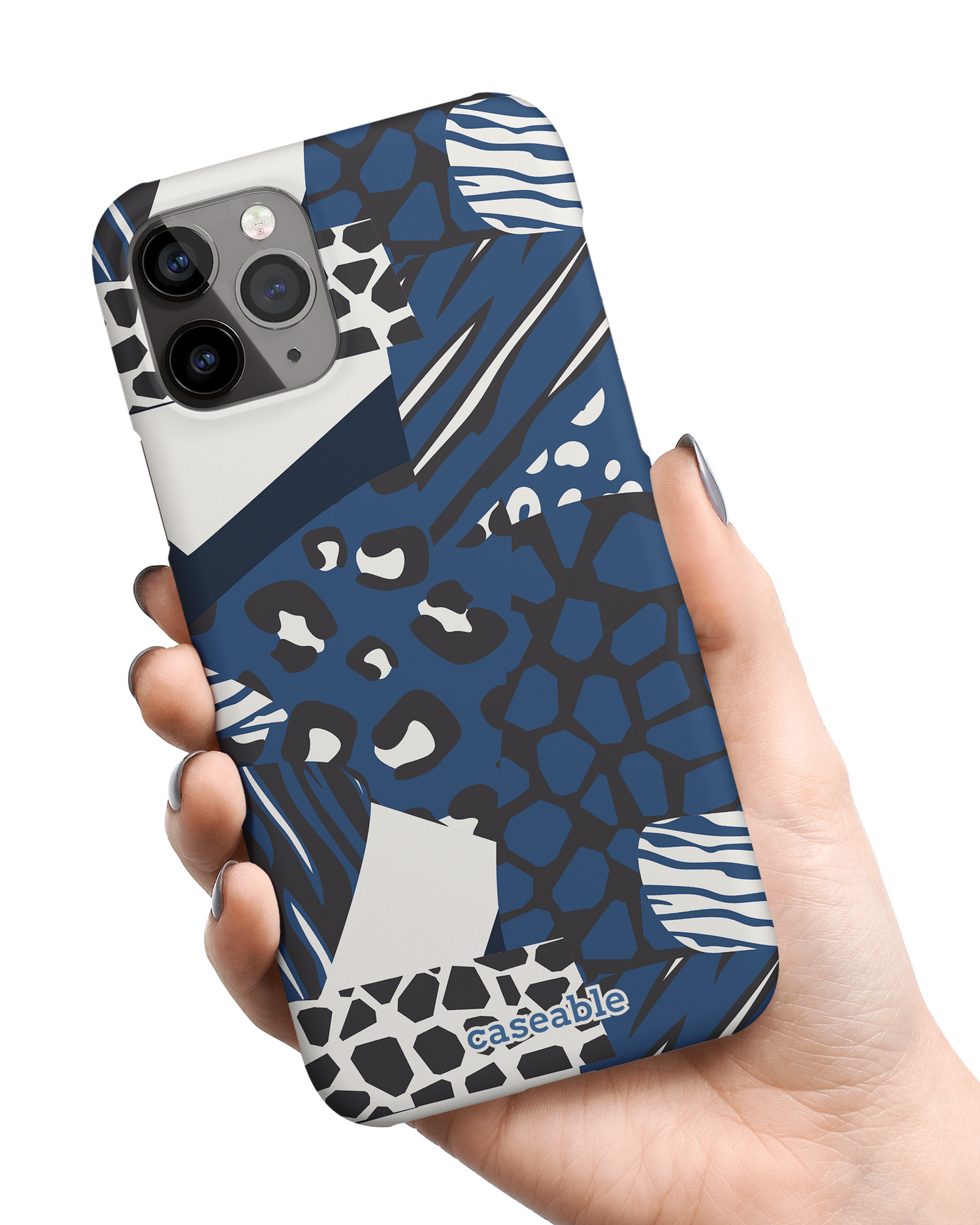 Animal Print Patchwork Hard Shell Phone Case Apple iPhone 11 Pro held in hand