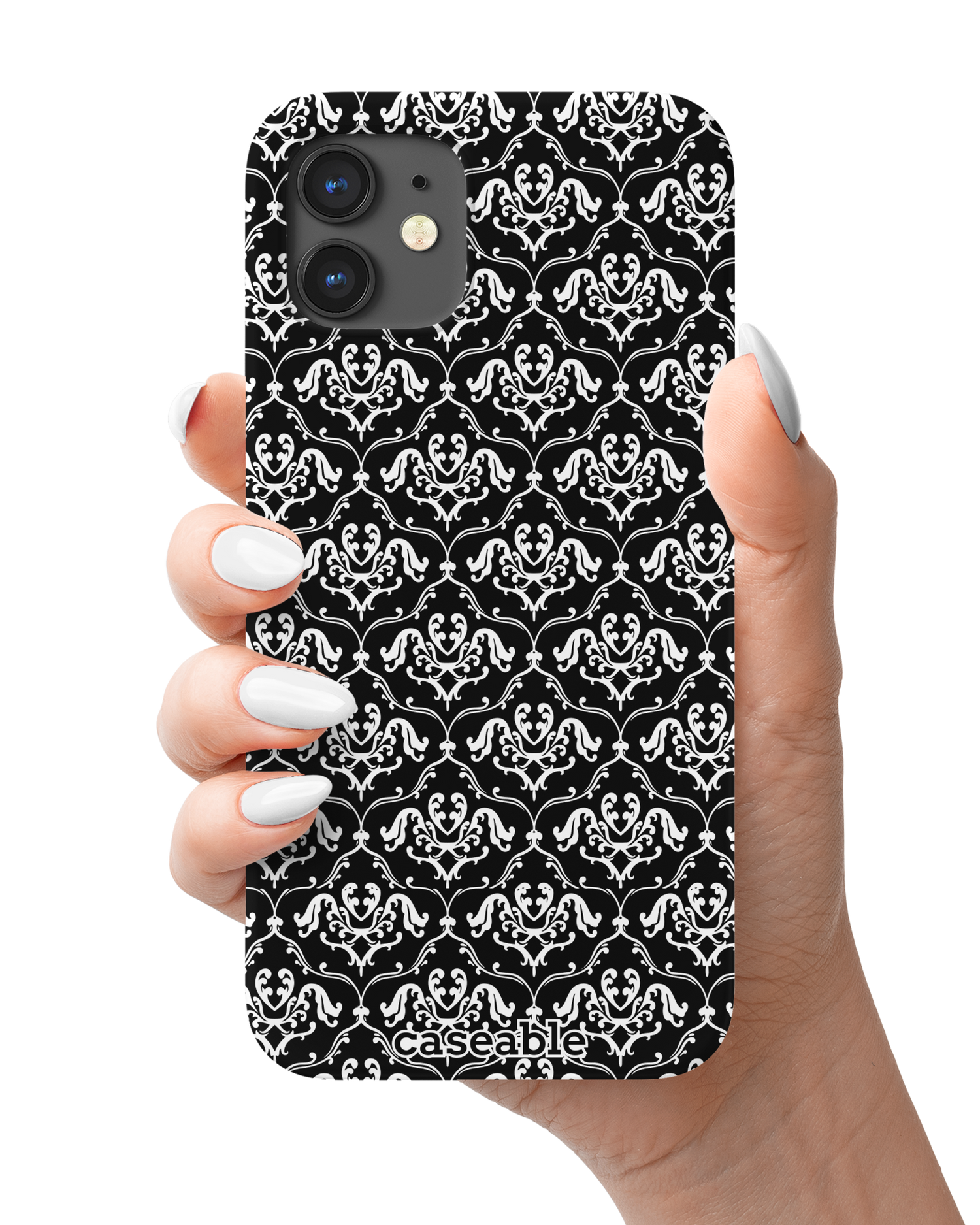 Black French Lillies Hard Shell Phone Case Apple iPhone 12 mini held in hand