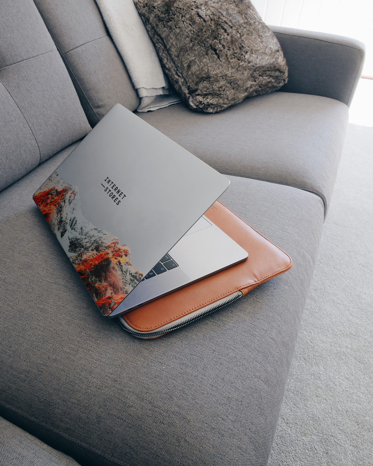 High Peak Laptop Skin for 15 inch Apple MacBooks on a couch