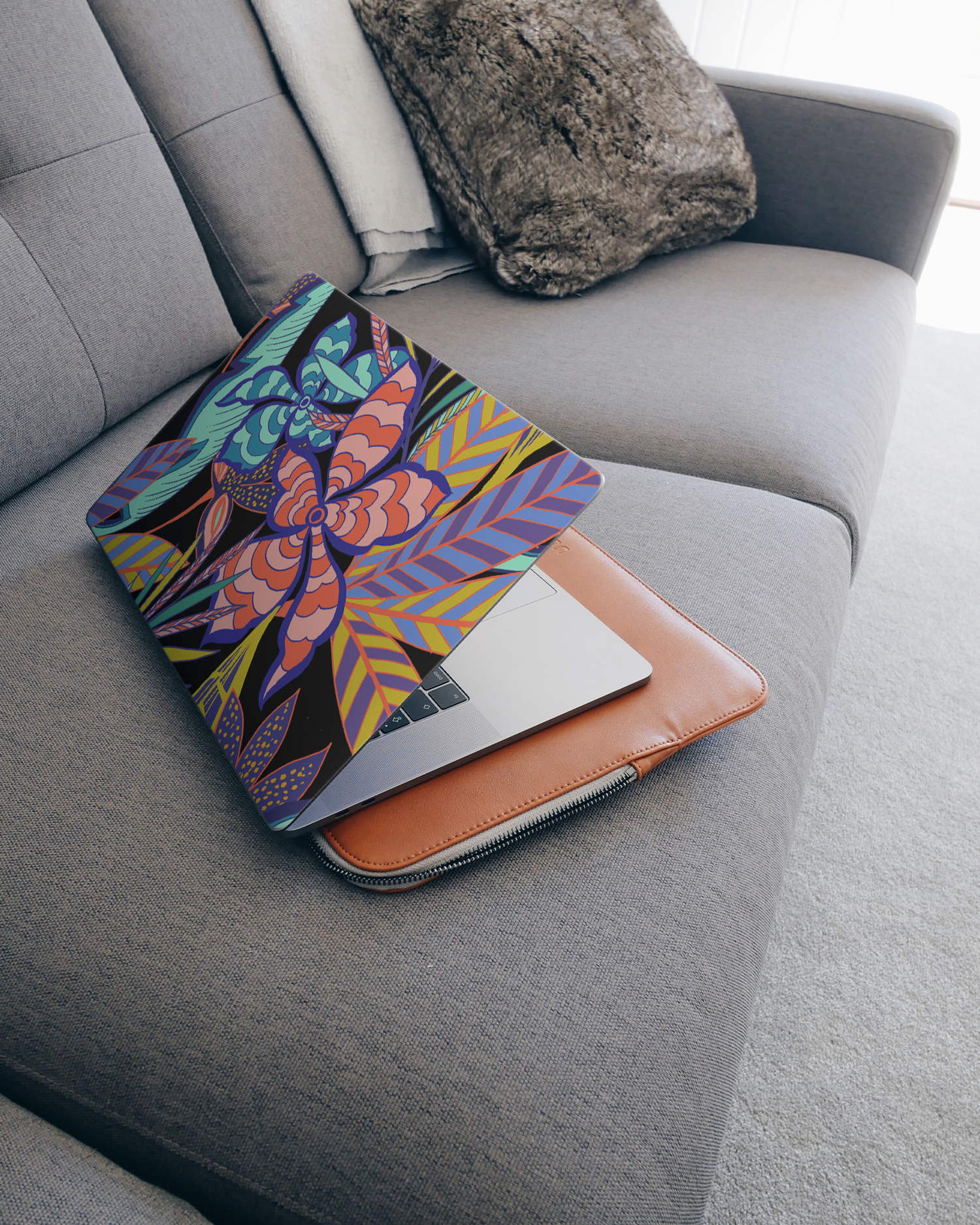 Tropical Psychedelic Pattern Laptop Skin for 15 inch Apple MacBooks on a couch