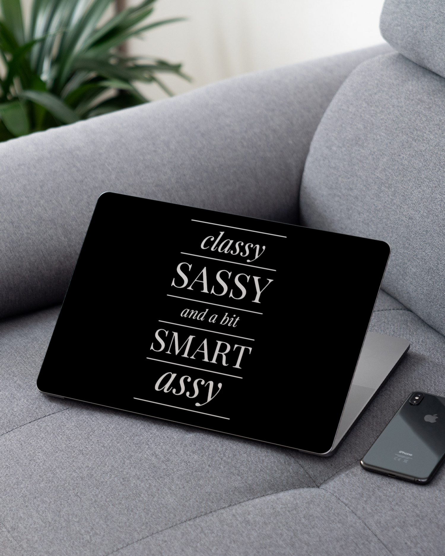 Classy Sassy Laptop Skin for 13 inch Apple MacBooks on a couch
