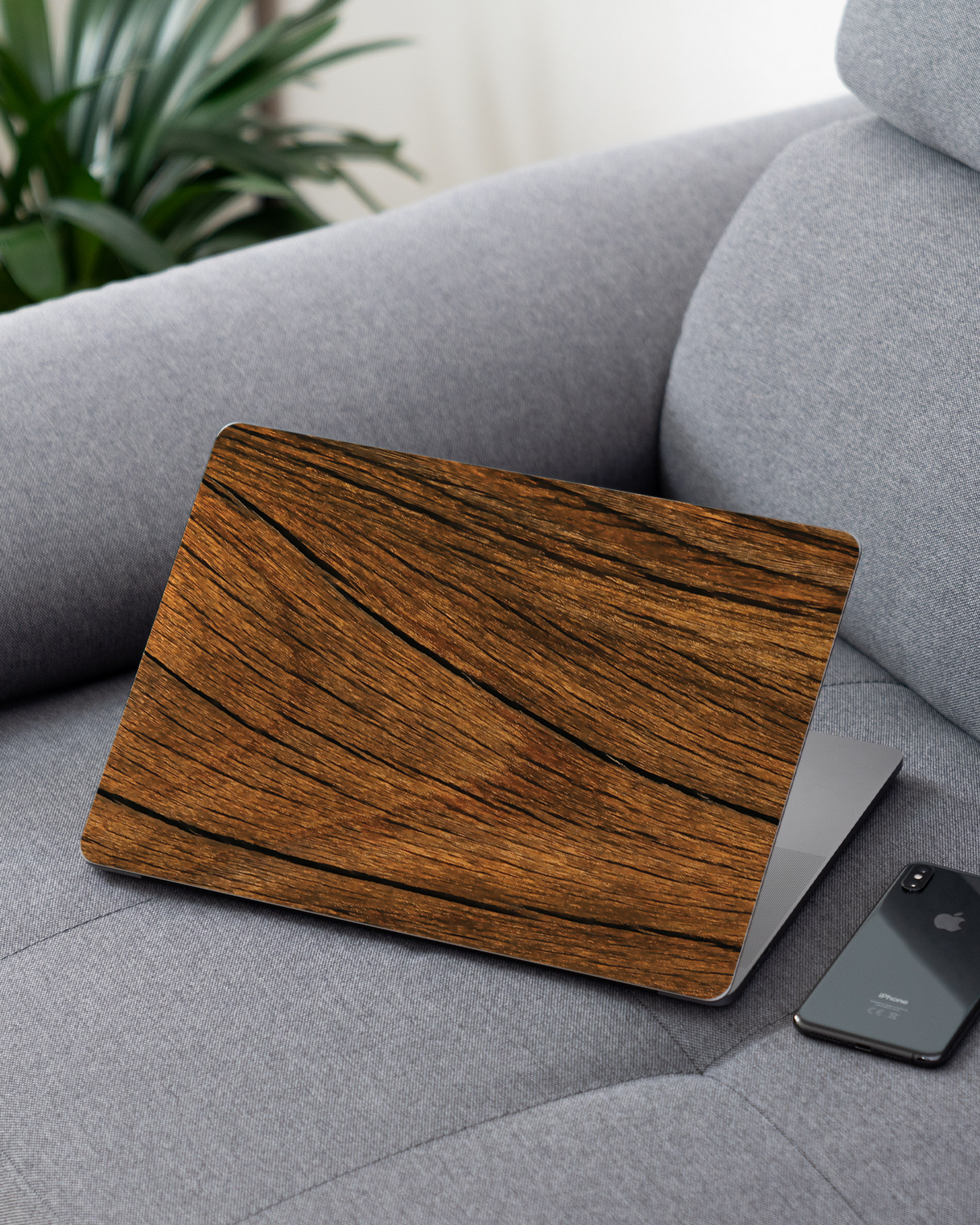 Wood Laptop Skin for 13 inch Apple MacBooks on a couch