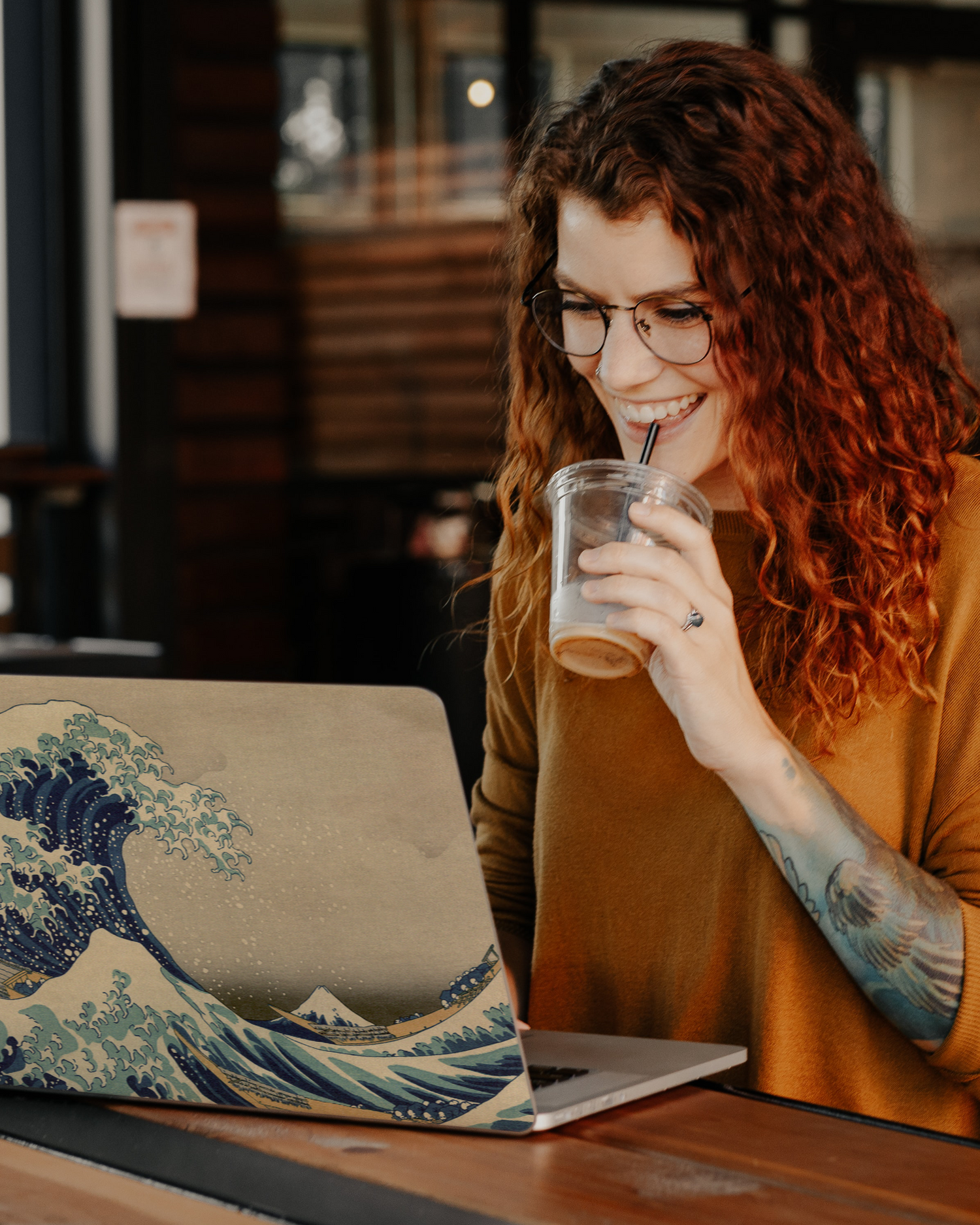 Great Wave Off Kanagawa By Hokusai Laptop Skin for 13 inch Apple MacBooks in a bar