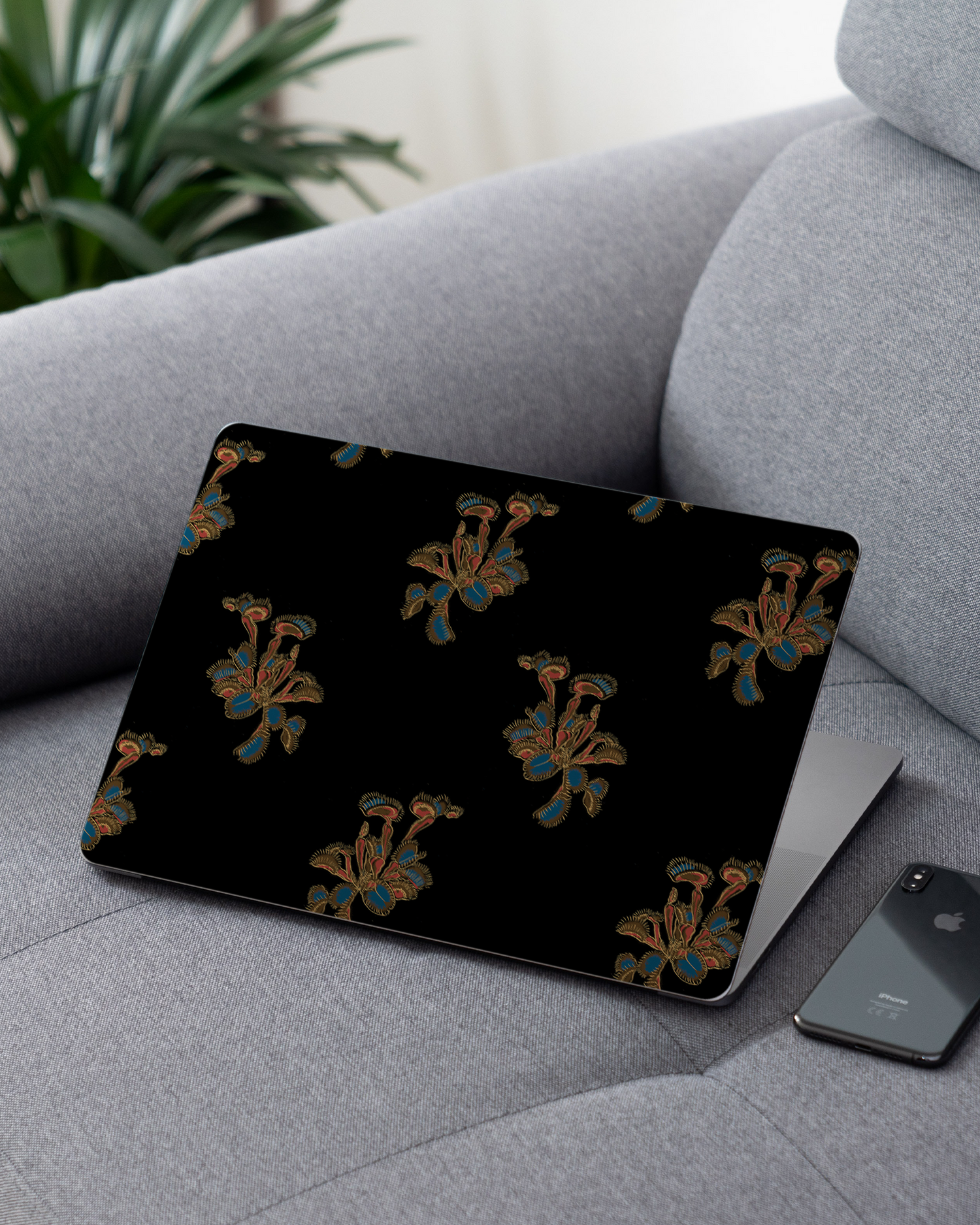 Venus Fly Trap Laptop Skin for 13 inch Apple MacBooks on a couch
