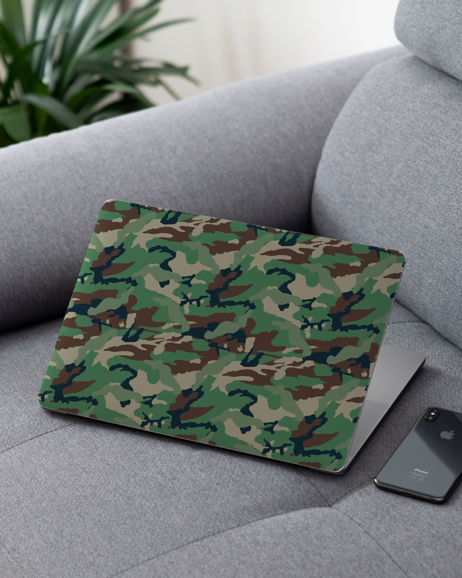 Green and Brown Camo Laptop Skin for 13 inch Apple MacBooks on a couch