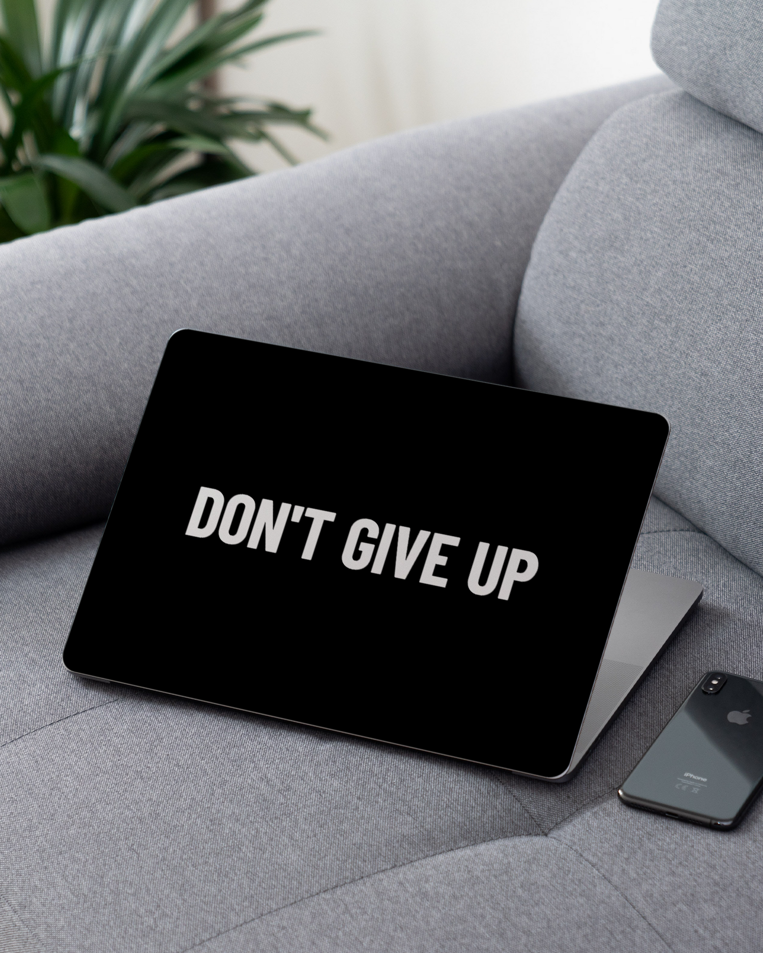 Dont Give Up Laptop Skin for 13 inch Apple MacBooks on a couch