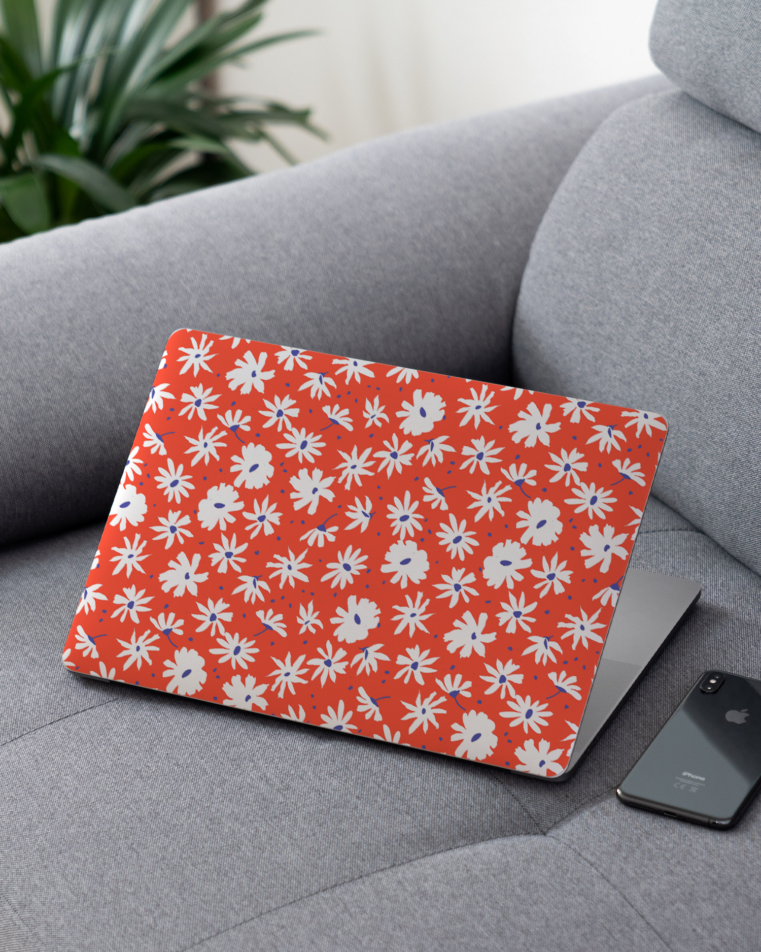 Retro Daisy Laptop Skin for 13 inch Apple MacBooks on a couch