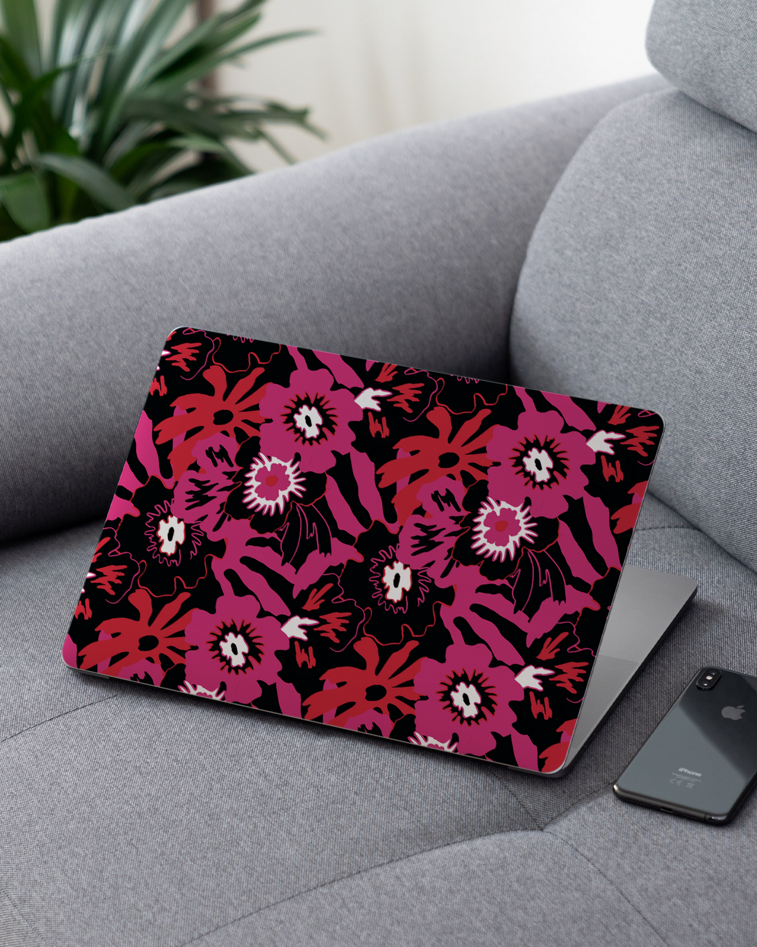 Flower Works Laptop Skin for 13 inch Apple MacBooks on a couch