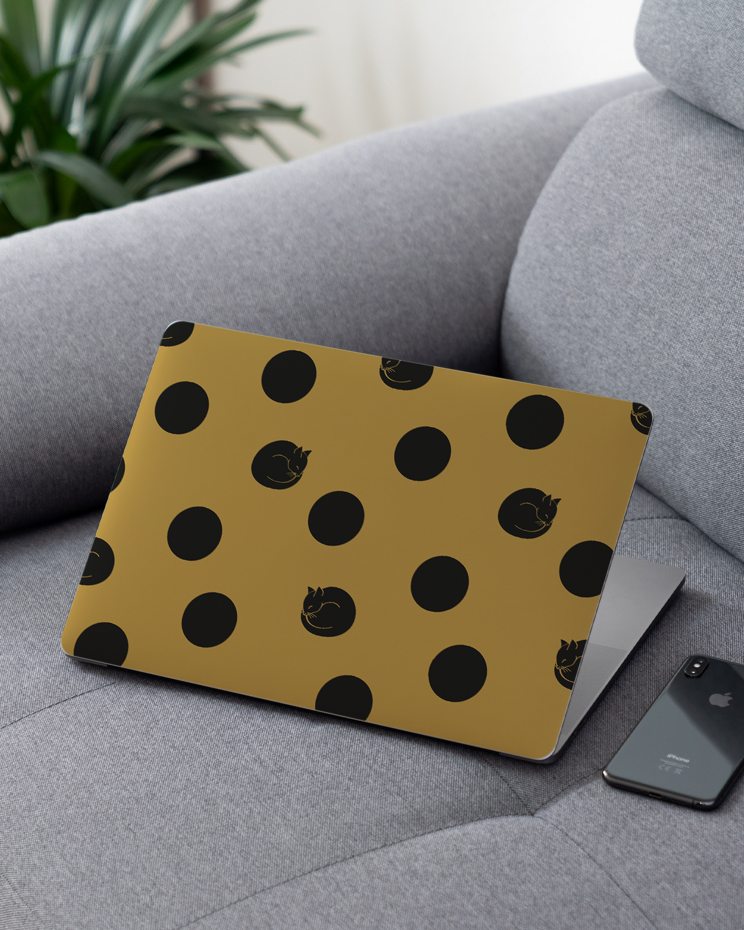 Polka Cats Laptop Skin for 13 inch Apple MacBooks on a couch