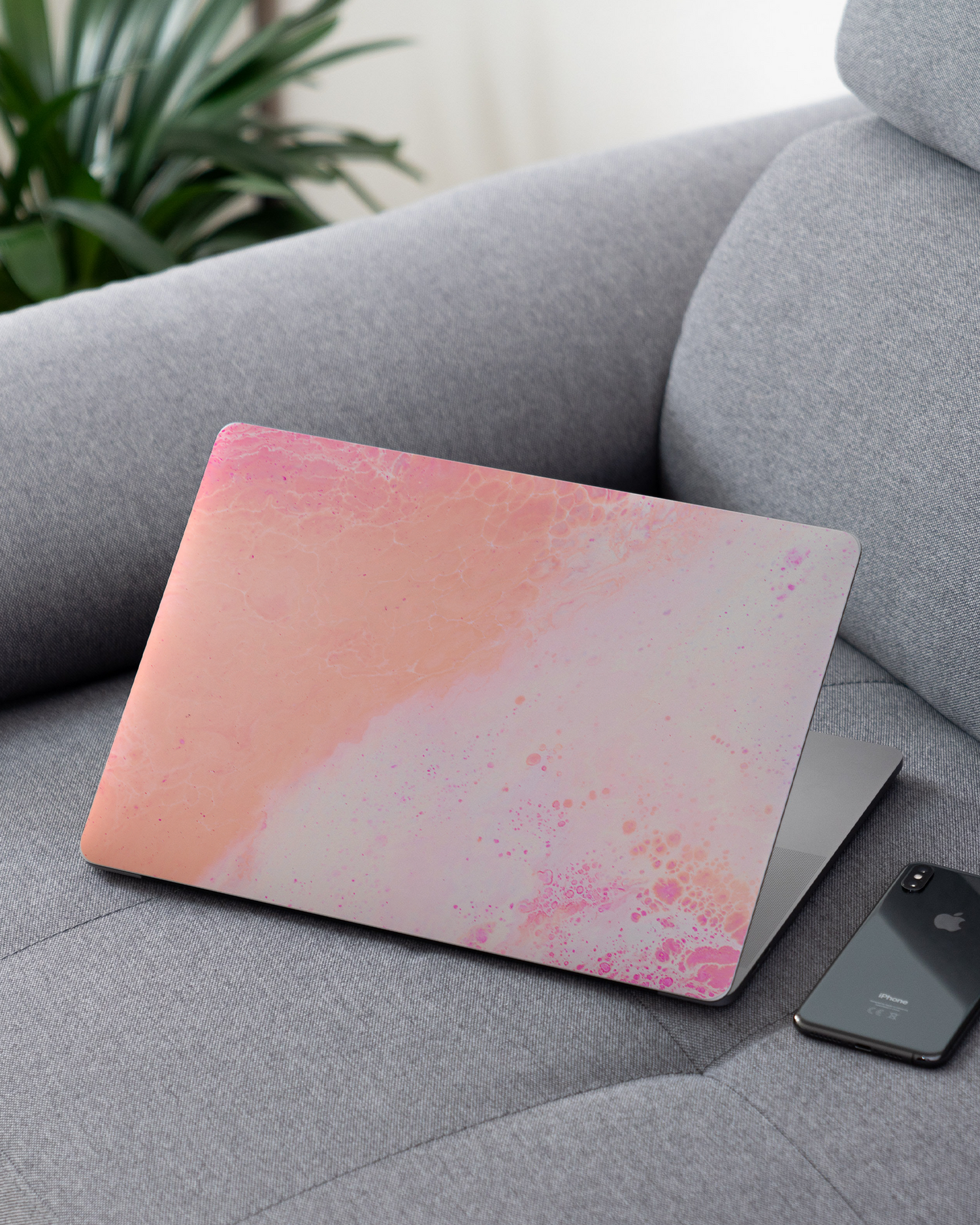 Peaches & Cream Marble Laptop Skin for 13 inch Apple MacBooks on a couch